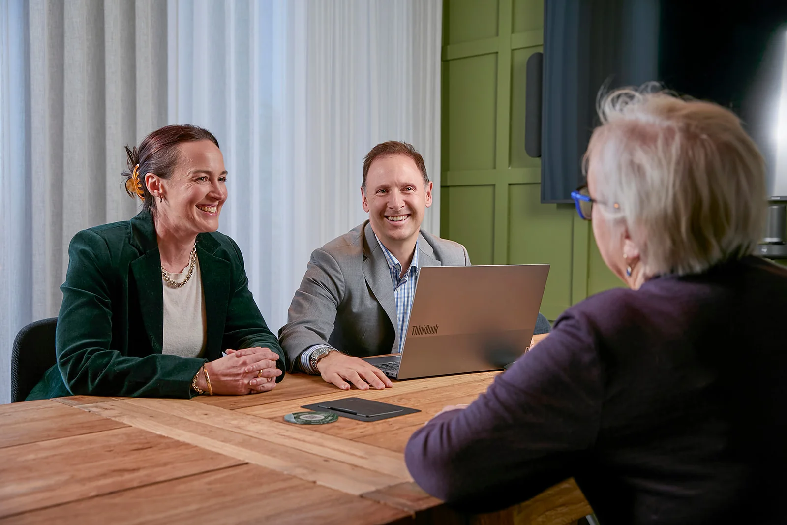 AMGENT adviser in a client strategy meeting